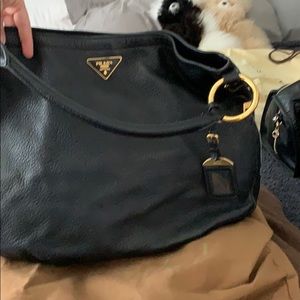 Prada bucket bag with dust bag